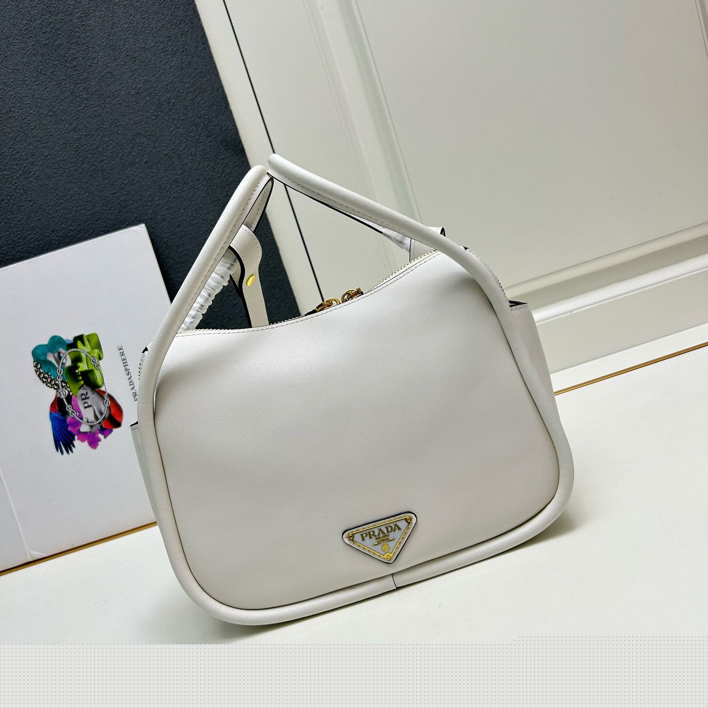 Pra*a top handle bags